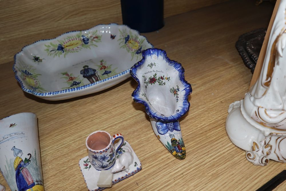 A group of Rouen faience wall pockets, a shoe, a mouse mug and a large dish, width 29cm